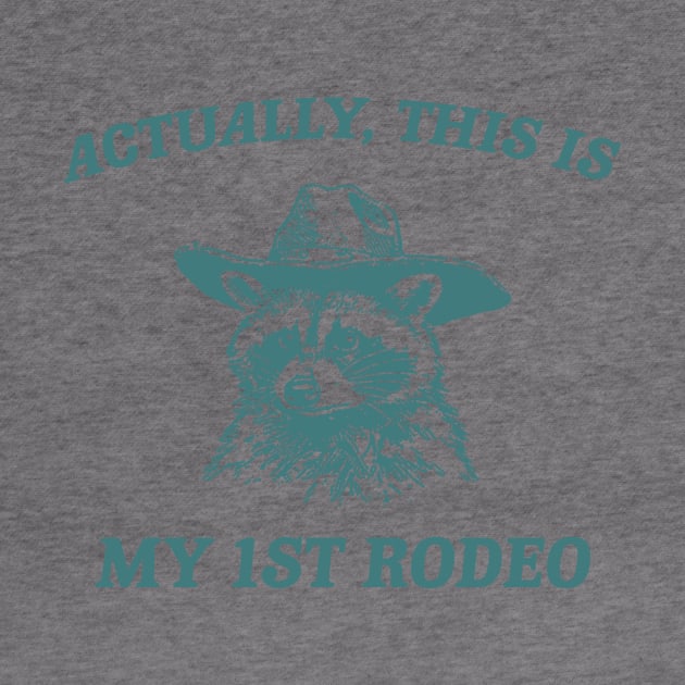 Raccoon Actually This Is My First Rodeo Shirt, Funny Trash Panda Meme by CamavIngora